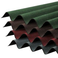 several different colors of roofing sheets on top of each other, all in various shapes and sizes