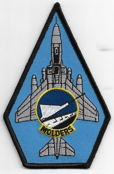 a patch with an airplane on it and the words molders written in blue