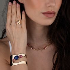 Suspended like glistening teardrops, the stones are here set in a bangle that reminds of ancient shapes and celebrates irregular forms. You won't need anything else to adorn your wrist. 925 Sterling Silver with 18ct Gold Premium Vermeil Lapis And Rhodonite Stone Concept Jewelry, June Birthstone Jewelry, Artisan Gift, Gifts For New Mums, Zodiac Jewelry, Pearl Jewellery Earrings, Jewelry Ring Box, Earring Sale, Men's Jewelry Rings