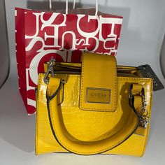 Never Use. With Tag Yellow Satchel With Top Carry Handle For On-the-go, Yellow Satchel Bag For On-the-go, Yellow Shoulder Bag With Double Handle, Yellow Bag With Detachable Strap For On-the-go, Trendy Yellow Crossbody Bag, Yellow Box Bag With Detachable Handle, Yellow Crossbody Bag With Top Carry Handle, Trendy Yellow Satchel With Adjustable Strap, Trendy Yellow Crossbody Satchel