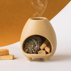 PRICES MAY VARY. Unique & Versatile Design: This mini chiminea ceramic design enhances the ambiance of any room with its elegance, uniqueness, and functionality. The ceramic palo santo and incense cone holder can be a perfect incense burner, candle holder, or crystal holder. It is an all-in-one meditation accessory for your spiritual decor needs to create moments of reflection, serenity, and intentional living. Broad Compatibility: This incense holder is designed to accommodate a range of burnin Insent Burner, Mini Chiminea, Sage Holder, Sage Sticks, Vendor Ideas, Smudge Bowl, Insence Burner, Sage Bundles, Home Decor Beige