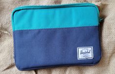 9" x 6" navy and green Herschel storage hygiene pouch bag. NWOT, great condition Green Zipper Travel Pouch, Portable Blue Travel Pouch, Blue Bags With Zipper Pouch For Storage, Blue Travel Pouch With Cell Phone Pocket, Functional Blue Pouch For School, Functional Blue School Pouch, Blue Rectangular Zipper Travel Pouch, Blue Zipper Pouch Travel Accessories, Blue Zipper Pouch For Storage