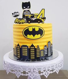 a batman themed birthday cake on top of a table