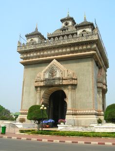 the entrance to an ornately designed building