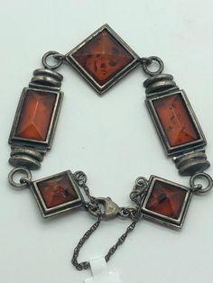 Vintage sterling silver amber bracelet. The widest part of the bracelet is one and a quarter inches. Bracelet is approximately 7 inches long Square Bracelet, Amber Bracelet, Chain Link Bracelet, Link Bracelets, Vintage Sterling Silver, Chain Link, Amber, Jewelry Bracelets, Bracelet