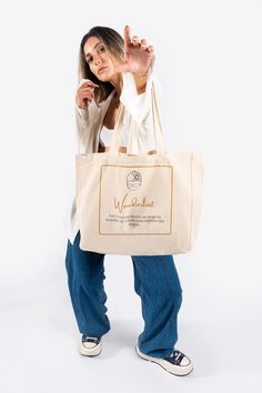 Introducing Our Minimalist Collection of 100% Cotton Canvas Bags 🌿 Elevate your style with our exclusive collection of 100% cotton canvas bags, designed for those who appreciate the beauty of simplicity. Our bags are not just accessories; they are a statement - a blend of functionality, sustainability, and exceptional craftsmanship. ✨ Key Features: 📏 Dimensions: 37cm wide x 39cm high - the perfect balance of practicality and elegance. 👜 Comfortable Straps: 70cm long, non-irritating straps for a secure and comfy fit, ideal for daily adventures. 🎨 Digital Prints: Unique designs brought to life with high-quality digital printing. Each bag tells a story with minimalist aesthetics and powerful mottos. 🌟 Why Choose Our Bags? 🖤 Minimalist Designs: Clean lines, subtle details, and timeless m Large Eco-friendly Canvas Bag As Gift, Large Eco-friendly Canvas Bag For Gifts, Large Eco-friendly Canvas Gift Bag, Recyclable Tote Canvas Bag For Gifts, Large Canvas Bag For Gifts, Large Canvas Gift Bag, Eco-friendly Shoulder Beach Bag As Gift, Large Capacity Natural Canvas Bag As Gift, Large Capacity Natural Canvas Bag, Ideal For Gifts