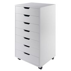 a white cabinet with five drawers on wheels