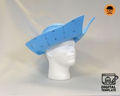 a white mannequin head wearing a blue hat