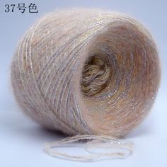 a ball of yarn sitting on top of a white table