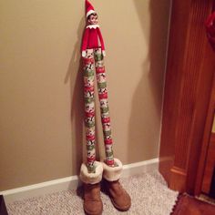 there is a elf standing next to the wall with his legs wrapped in leggings