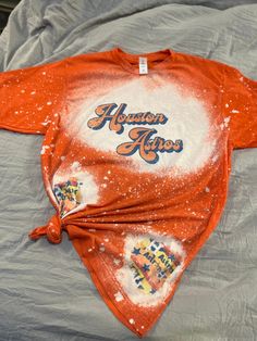 bleach splatter Astros baseball tee in orange or blue Mom Clothes, Astros Baseball, Baseball Mom, Mom Outfits, Baseball Tee, Santa Fe, Bleach, Adult Outfits, Tops & Tees