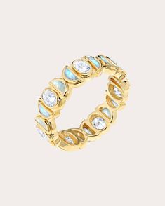 Shimmer and luster combine in this 18-karat gold ring that forms its band from a bezel-set array of oval-cut diamonds and semi circle-shaped moonstones. From Maison Tjoeng's Bebe Collection, a fresh take on classic jewelry. 18k yellow gold, moonstone and diamond Carat: 1.05 ctw diamond, 1.4 ctw moonstone Diamond color: F-G Diamond clarity: VS1-SI1 Polish with soft cloth Made in Hong Kong Measurements Width: 2.1mm Gold Moonstone Ring, Interesting Jewelry, It Band, Diamond Carat, Oval Cut Diamond, Gold Shimmer, Classic Jewelry, Moonstone Ring, Diamond Color