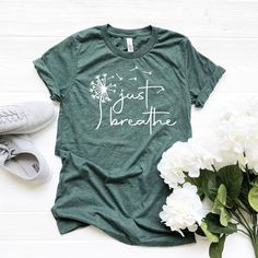 Hi! Just Breathe Shirt , Meditation Thirt, Yoga T-shirt, Relax,  Dandelion Outfit,  Floral Girl Clothes, Positive Svg, Christian Tee, Blessed  Welcome to my store and it's great to see you here! I'm sure you'll love my designs. Please let me know if you have any questions and recommendations. The Unisex t-shirts are retail fit and a little bit relaxed. If you want to have a fitter look, I recommend you order one size smaller. But make sure you check our size-chart before you place your order. Th Green Pre-shrunk Tops For Spring, Green Shirt With Text Print For Spring, Comfortable Crew Neck Top With Screen Print, Green Comfortable Cotton Top, Green Comfortable Crew Neck Top, Green Comfortable Fit Crew Neck Top, Green Crew Neck Top With Comfortable Fit, Green Crew Neck Tops, Dandelion Outfit