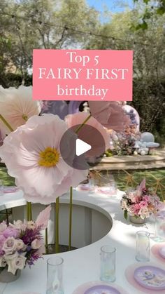 a table with pink flowers and plates on it that says top 5 fairy first birthday