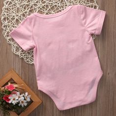 Description: Witty parents are the best that like to have fun in everything and especially dressing their babies in entertaining quoted clothes. The Funny Smell Romper is equally amusing to elders, as it looks adorable on babies. The cotton-made fabric is comfortable to wear and does not cause any irritation to the baby’s skin. The wide neckline and the lap shoulders assist in easy dressing. The snap buttons at the end are convenient for quick diaper changes. The romper could be worn at family g At Family, The Funny, Baby Cribs, Bridal Shower Gifts, Short Rompers, Simple Dresses, Have Fun, Baby Onesies, Black Pink