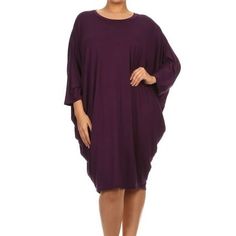 Product Description: Embrace a blend of comfort and style with our Plus Size Midi Dress, featuring elegant dolman sleeves and a relaxed, loose fit. This dress is perfect for those who prioritize both style and comfort in their everyday wear. Crafted from soft, breathable fabric, the dress flows effortlessly from a casual day out to an evening event. The 3/4 dolman sleeves add a modern twist to the silhouette, providing ample movement and a flattering look for all body types. Its solid color and Purple Plus Size Evening Wear, Purple 3/4 Sleeve Spring Dress, Plus Size Midi Dress, Moa Collection, Midi Dress With Sleeves, Plus Size Casual, Dolman Sleeve, Look Chic, The 3