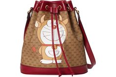 Gucci x Doraemon Bucket Bag Small Ebony/Beige in Canvas with Gold-tone Small Buckets, Italy Print, Gucci Bags, Leather Design, Fast Fashion, Small Bags, Gucci Bag, Red Leather, Contact Us