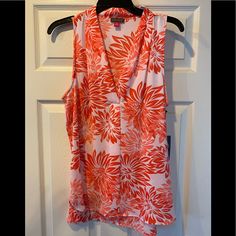 Brand New With Tags. Vince Camuto Chiffon Sleeveless Top In Peach/Coral And White Design. Size Medium. Very Flowy Material For Summertime. Fast Shipping! Fitted Sleeveless Vacation Blouse, Sleeveless Floral Print Blouse For Beach, Sleeveless Summer Blouse For Vacation, Split Blouse, Chiffon Sleeveless Top, Satin Tank Top, Lace Trim Blouse, Floral Print Tunic, Gold Blouse