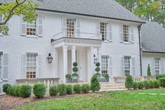 a large white house with columns and windows