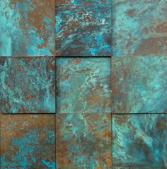 an abstract painting made up of different colors and textures, including rusted metal sheets