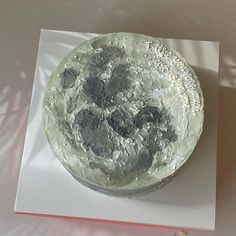 there is a cake that has been decorated with rocks