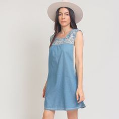 Embroidered Chambray Button Back Mini Dress. Brand: Thml Details Color: Denim Blue Multi Button Closure Back Front/Back Embroidered Detail Unlined Contrast Side Insets 100% Cotton Hand Wash Or Dry Clean True To Size Measurements: Xs: Bust = 35" | Length = 33" S: Bust = 36" | Length = 34" M: Bust = 38" | Length = 34" L: Bust = 40" | Length = 34.5" We Will No Longer Be Responding To Offers Made On Boutique Items. All Our Boutique Styles Come Directly From Our (Off Poshmark) Small Boutique. We Cann Light Wash Cotton Dress With Buttons, Fitted Summer Denim Dress With Floral Embroidery, Fitted Denim Dress With Floral Embroidery For Summer, Fitted Floral Embroidered Denim Dress For Summer, Summer Fitted Denim Dress With Floral Embroidery, Summer Medium Wash Denim Dress With Floral Embroidery, Denim Blue Cotton Mini Dress For The Beach, Cotton Embroidered Dress With Lace Trim, Spring Cotton Embroidered Dress With Lace Trim