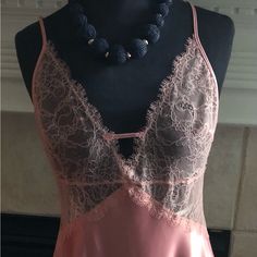 This Is Nwot, Never Worn. Silky And Smooth To The Touch With Cross Straps On The Back. It Is Size Large And Lace Is Elastic Length: 32” Burst: 17” Lace Closure Camisole For Night Out, Feminine Sheer Camisole For Night Out, Sheer Feminine Camisole For Night Out, Victoria's Secret Lace Sleeveless Camisole, Pink Sheer Slip Dress, Party Sleepwear Camisole With Delicate Straps, Sheer Pink Slip Dress, Sleeveless Delicate Lace Sleepwear For Party, Victoria's Secret V-neck Camisole For Sleep