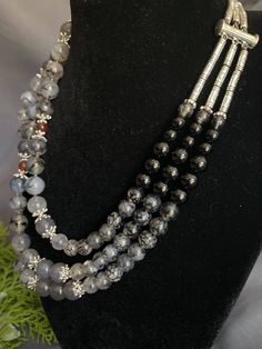 Length: 42.5cm (16.75in)*Necklace “Smokey Dragon” - Black Dragon Vein Agate, Gray Agate, Red Agate, Black Agate, Gray Agate Pendant, Metal Accessories.Намисто “Димчастий дракон”- Чорні жили дракона агат, сірий агат, червоний агат, чорний агат, падвіска з сірого агату, металева фурнітура. Agate- will bring order, harmony in relationships, promotes self-confidence, will help to overcome fear. Also, relieves cramps, and protects against infections. It is recommended to wear white agate for throat d Round Onyx Beaded Necklaces For Gifts, Gift Onyx Beaded Necklaces, Round Onyx Beaded Necklace As A Gift, Round Onyx Beaded Necklace For Gift, Black Carnelian Jewelry For Gifts, Silver Obsidian Necklaces, Silver Obsidian Necklace With Natural Stones, Handmade Obsidian Necklaces For Meditation, Onyx Gemstone Beads Necklace