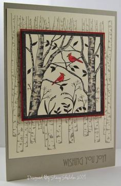 a card with trees and birds on it