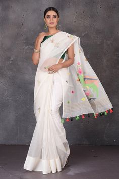 Shop stunning white resham Jamdani saree online in USA. Flaunt your ethnic style on special occasions with latest designer sarees, pure silk sarees, handwoven sarees, Kanchipuram silk sarees, embroidered sarees, georgette sarees, party sarees from Pure Elegance Indian saree store in USA.-full view White Chanderi Pre-draped Saree With Zari Work, Embroidered White Pre-draped Saree For Festivals, White Cutdana Pre-draped Saree For Puja, White Handloom Pre-draped Saree For Diwali, Designer White Chanderi Blouse Piece, White Traditional Wear For Diwali, White Handloom Pre-draped Saree, Eid Designer White Pre-draped Saree, White Pre-draped Designer Saree For Eid