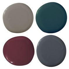 four different colors of paint on plates in the same color as they appear to be white, blue, and red