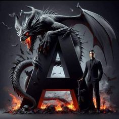 two men standing in front of a large letter with a dragon on it