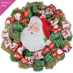 a christmas wreath with santa claus on it