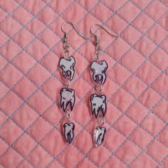 Hand drawn teeth illustrations on shrink dink plastic. Shrinkie Dink Ideas, Weird Jewelry Aesthetic, Shrinking Plastic Earrings, Shrinks Dink Earrings, Shrinks Dink Ideas, Cute Shrinky Dink Ideas, Shrink Plastic Ideas, Shrink Earrings, Shrink Plastic Charms