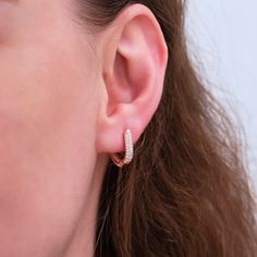 These delicate earrings can add the perfect amount of style flair to any summer outfit! Get yours today and create new trends all season long. Metal: 925 sterling silver (18K rose gold-plated) Measurements: 1.4 x 1.2 cm / 0.5 x 0.4" Stones: cubic zirconia Fastening: latch back Hypoallergenic: nickel-free materials used therefore suitable for those with metal allergies Trendy Cubic Zirconia Huggie Earrings, Dainty Rose Gold Diamond Earrings For Everyday, Trendy Rose Gold Sterling Silver Earrings, Everyday Dainty Rose Gold Diamond Earrings, Trendy Hypoallergenic Rose Gold Earrings, Rose Gold Minimalist Diamond Earrings For Pierced Ears, Everyday Rose Gold Huggie Diamond Earrings, Minimalist Rose Gold Hypoallergenic Diamond Earrings, Minimalist Hypoallergenic Rose Gold Diamond Earrings