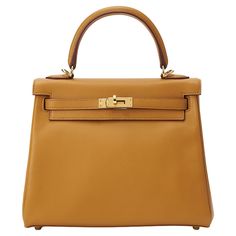 Hermès Kelly 25 in sesame and swift leather with gold hardware. The bag is unworn and comes as full set including the original receipt. Stamp Y (2020) Hermes Kelly 25, Kelly 25, Hermes Bag, Handle Bag, Fashion Handbags, Full Set, Gold Hardware, Top Handle, The Original