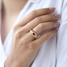 Introducing our exquisite handmade jewelry collection on Etsy, where elegance meets craftsmanship in every piece. Behold the stunning 14k gold ring adorned with a captivating red round gemstone a symbol of passion and love. Crafted with meticulous attention to detail, this solid gold ring is more than just jewelry; it's a promise of eternal devotion. Whether you're searching for the perfect birthday gift, a meaningful anniversary present, or a unique piece to celebrate Mother's Day, this ring is sure to leave a lasting impression. Indulge in the luxury of solid gold as it gleams against the skin, exuding warmth and sophistication. The vibrant red gemstone adds a pop of color and personality, making it a standout piece in any collection. Designed to be versatile yet eye-catching, this ring 14k Gold Dome Ring With Ethical Gemstones, Elegant Signet Ring With Birthstone In Round Band, Elegant Signet Ring With Birthstone, Fine Jewelry Dome Ring With Bezel Setting For Gift, Minimalist Dome Ring With Bezel Setting As Gift, Elegant Ruby Signet Ring As Gift, Elegant Ruby Signet Ring For Gift, Open Dome Ring With Bezel Setting As Gift, Minimalist Gemstone Dome Ring As Gift