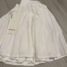 New. White Color High Rise Pleated Tennis Skirt. Size 2, 4, 6, 10. Please Order Correct Size. Thank You. Lululemon Tennis Skirt, Pleated Tennis Skirt, White Skirt, Tennis Skirt, Fit N Flare Dress, White Skirts, Fit & Flare, Flare Dress, Trending Accessories