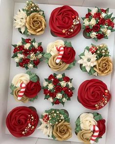 the cupcakes are decorated with flowers and candy canes