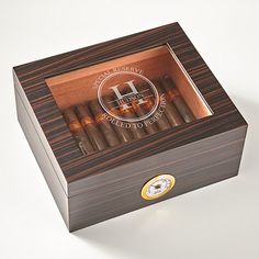 For the man who enjoys the finer things in life—like a quality cigar—this luxurious humidor displays his collection in style—and keeps it in perfect smoking condition. The Spanish cedar interior helps retain humidity, while preserving the cigars and enhancing their aroma and taste.   Exclusively from RedEnvelope. Cedar Interior, 50th Birthday Gifts For Men, Cigars And Whiskey, Humidor, 50th Birthday Gifts, Unique Personalized Gift, Bars For Home, 50th Birthday, Gifts For Men