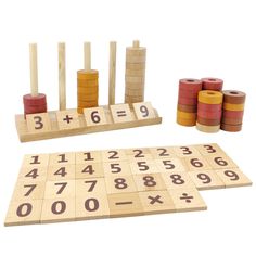 a wooden game set with numbers and dices