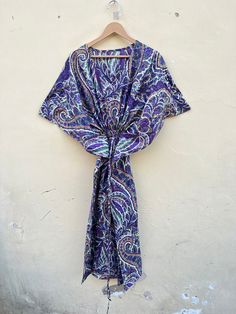 we pack our order in reusable bag , so basically we provide our customers a reusable bag , so they can use it for many days.... This Beautiful Hand Block Print Caftan or can be called as Tunic is made with super fine quality cotton and designs have been crafted by Hand Prints. Usage - Tunic, Gown, Maxi, Bikini Cover up, Beach Wear, Caftan etc. Fabric - 100% Cotton Color - Green  Pattern - Flower Size - Plus Size, can fit Up To 4XL Bust/chest size - Free Size ( Drawstring ) Length - 30",40",48" Inches (Approx.) * It has Adjustable Drawstring Waist. * V Shape Neck Which is 8" Inches Deep. * Very comfortable to wear in both hot or cold weather. International buyers are responsible for their countries duties and taxes. Note:- Please share your contact no for Delivery DHL , Fedex and ARAMEX Multicolor Wrap Kaftan For Festival, Multicolor Wrap Kaftan For Beach, Festival Patterned Kaftan With Kimono Sleeves, Patterned Kaftan With Kimono Sleeves For Festival, Multicolor Wrap Kaftan For Vacation, Multicolor Wrap Kaftan For The Beach, Traditional Summer Wrap Kaftan, Traditional Wrap Kaftan For The Beach, Casual Purple Tunic Kaftan