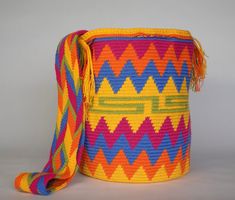 Mochila purse made by artisans of the Wayuu Indigenous Group in Colombia Purchased directly from Artisan, on a Fair Trade Basis Fully Handmade For each Wayuu Mochila Bag purchased, Hands of Colombia donates thread to Indigenous Artisans. Only ONE available Add a touch of indigenous craftsmanship to your style with our Luniqizieuqi Wayuu Handmade Mochila Purse. Each purse is meticulously handmade by skilled artisans from the Wayuu Indigenous Group in Colombia. Hands of Colombia purchases each ite University Bag, Mochila Bag, Handmade Purse, Handmade Purses, Overnight Bag, Everyday Bag, Drawing Inspiration, Fair Trade, Unique Fashion