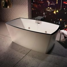 a white bath tub sitting on top of a tiled floor