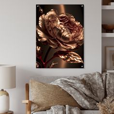 a living room scene with focus on the large flower and the wall hanging above it