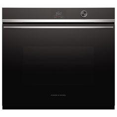 a black oven with the door open on an isolated white background for use in commercial projects