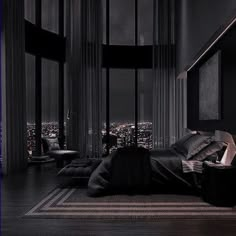 a bedroom with a view of the city at night