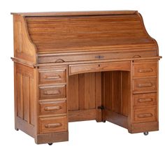 an old fashioned wooden desk with drawers