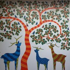 an image of a tree with animals painted on it