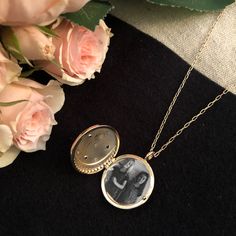 A starry night sky locket with a crescent moon and stars keeps a treasured photo inside. The back is inscribed "you are magic". This is truly a magical gift or keepsake. The locket is 7/8" in diameter and on a 17 1/2" long chain with a 3 1/2" extension. All orders over $50 ship for free within the USA. All orders usually ship within 24 hours. Celestial Style Locket Jewelry Gift, Round Locket Necklace With Charms For Keepsake, Spiritual Personalized Locket Jewelry, Spiritual Keepsake Round Pendant Locket Necklace, Personalized Spiritual Medallion Locket Necklace, Spiritual Locket Jewelry For Personalized Gift, Vintage Charm Medallion Locket Necklace For Keepsake, Antique Moon Phase Jewelry Gift, Vintage Medallion Locket Necklace For Keepsake